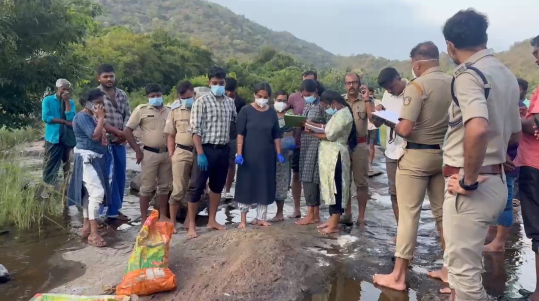 Police investigating the scene at Bhavani river